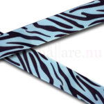Band 25 mm med mönster av zebra på babyblå bakgrund