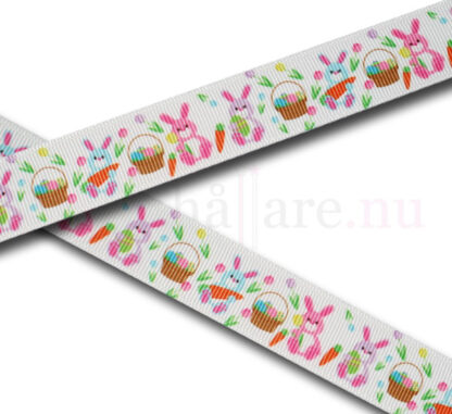Band 22 mm, vit med påskharar i rosa, lila och blå